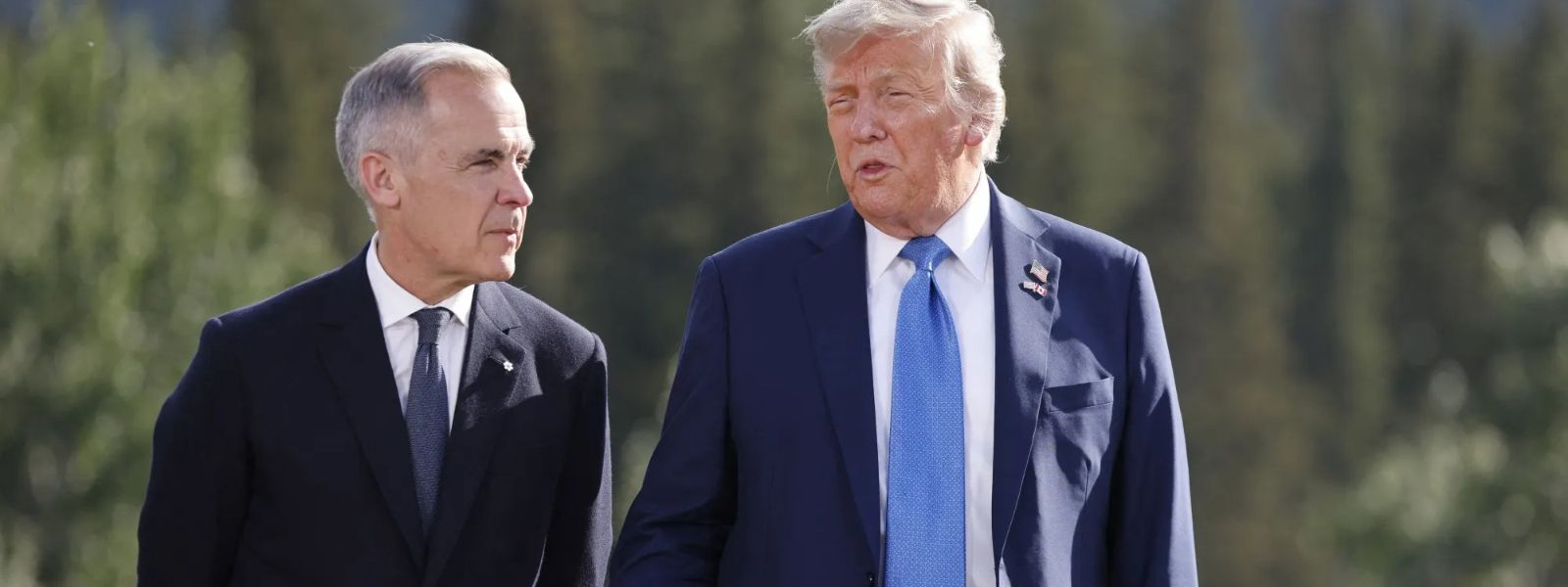 Trump slaps 50% tariffs on Canada and Carney vows to 'intensify' trade talks